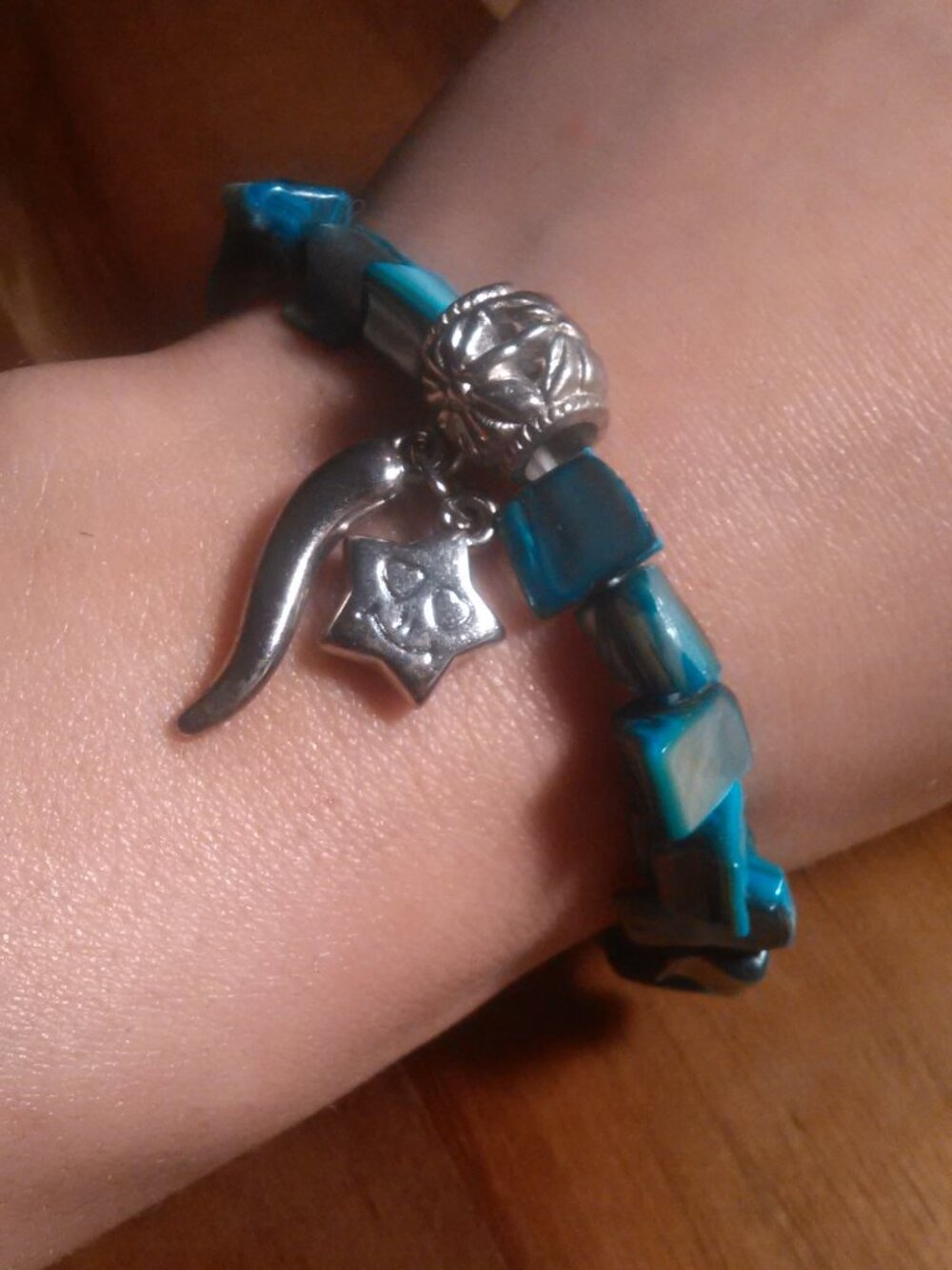 Blue Shell and Silvertone Star Charm Stretch Bracelet